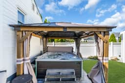Steps to Beach - Hot Tub - Driveway Parking - 2BR - Image 2